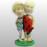 Stone Age couple bobblehead doll