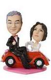 Wedding bobblehead with red car