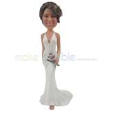 The bride wears a long dress custom bobbleheads