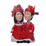 The couple are wearing costume custom bobbleheads