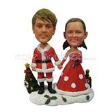 The couple's Christmas custom bobbleheads