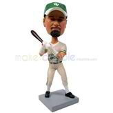 The golf man is holding the club custom bobbleheads