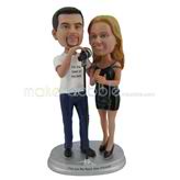 The man and the woman are singing custom bobbleheads