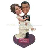 The man holds his wife custom bobbleheads