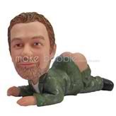 The man is lying on the floor with bare buttock custom bobbleheads