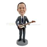 The man is playing the guitar custom bobbleheads