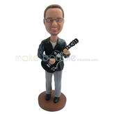 The man is playing the guitar custom bobbleheads