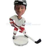 The man is skating custom bobbleheads