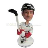 The man is skating custom bobbleheads