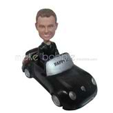 The man sits in the car custom bobbleheads