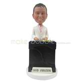 The man stands behind the desk custom bobbleheads