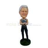 The man stands with his hands custom bobbleheads