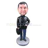 The man takes a bag custom bobbleheads