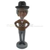 The man wears a cowboy hat custom bobbleheads