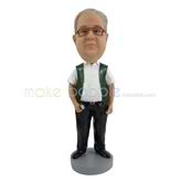 The man wears a vest custom bobbleheads