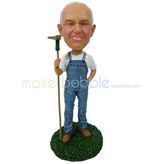 The old farmer holds a hoe custom bobbleheads