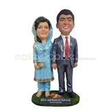 The suit man and his wife custom bobbleheads