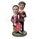 The suit man and his wife custom bobbleheads