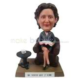 The woman boss sits on the couch custom bobbleheads
