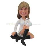 The woman is wearing boots custom bobbleheads