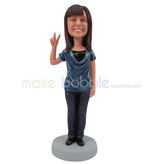 Custom woman bobbleheads make the V-sign