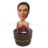 The woman sits in the bath custom bobbleheads