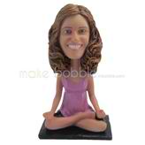 The woman sits on the floor custom bobbleheads