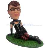 The woman sits on the lawn custom bobbleheads