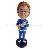 The woman takes a cup custom bobbleheads