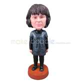 The woman wears a black coat custom bobbleheads