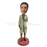 The woman wears a long coat custom bobbleheads