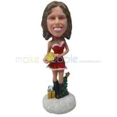 The woman wears a red dress custom bobbleheads