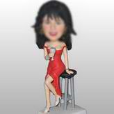 Woman bobblehead in drinking at the bar