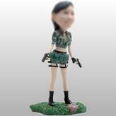 Woman bobble head doll with Gun