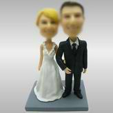 Young Couples bobble head dolls