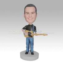 homme professionnel sur mesure et guitare figurines